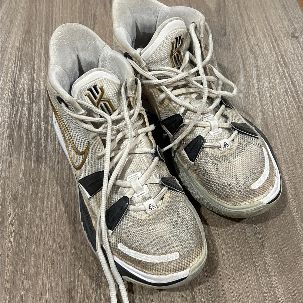 Nike Kyrie Cream and Black Sneakers